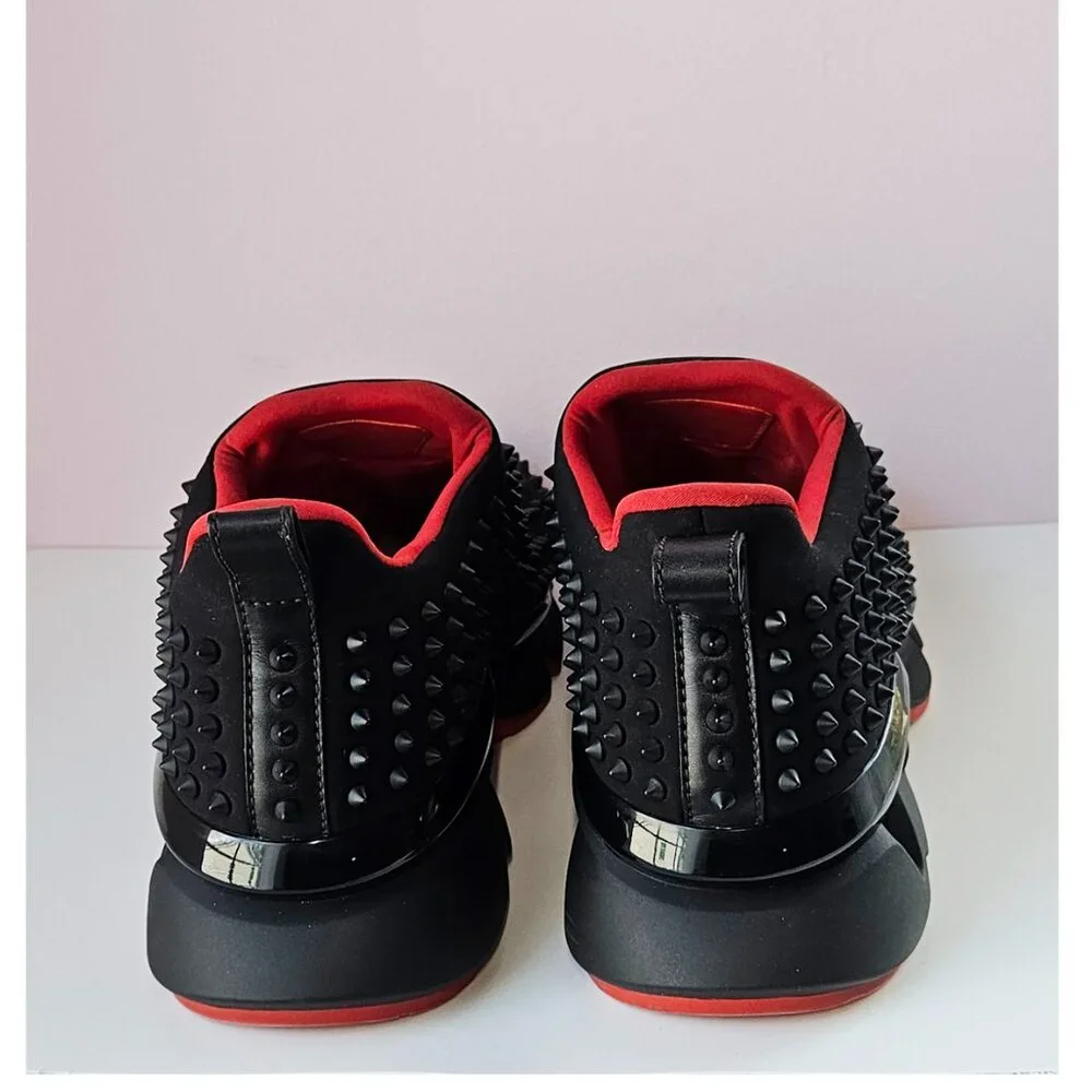 Christian Louboutin Spike Sock Sneakers.